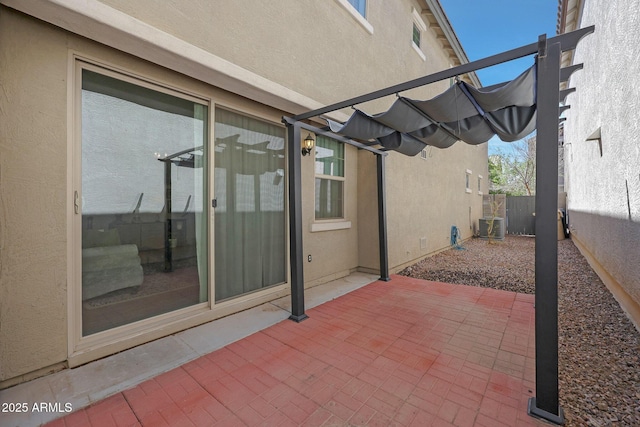 view of patio / terrace featuring fence