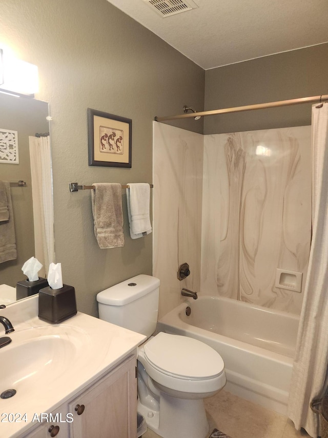 full bathroom featuring tile patterned floors, shower / bath combo, toilet, and vanity