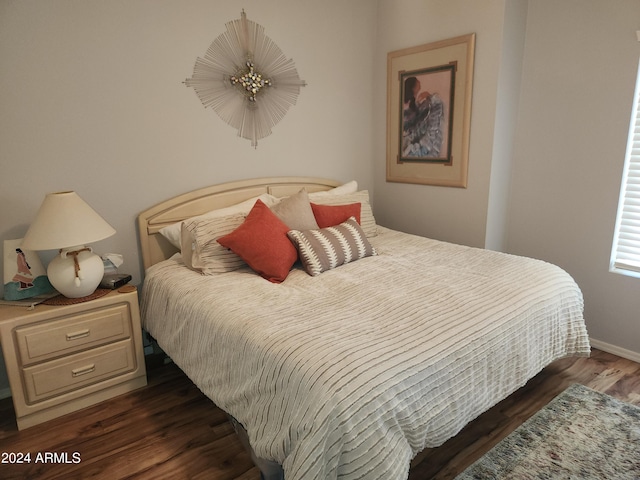 bedroom featuring dark hardwood / wood-style floors