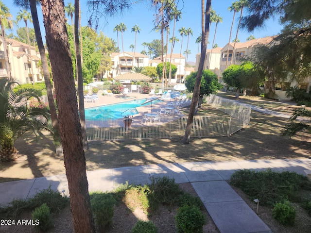 view of swimming pool with a patio area