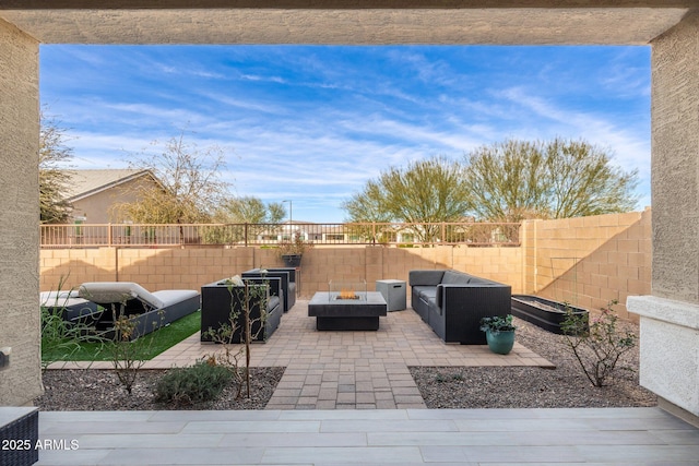 view of patio featuring an outdoor fire pit