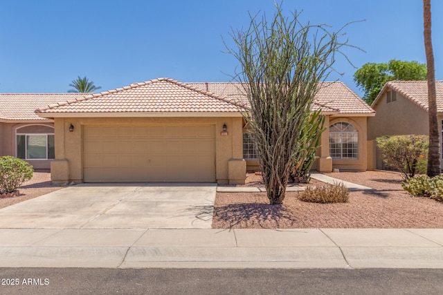 1371 W Gary Dr, Chandler, AZ 85224 - view of front of home with stucco siding, driveway, and a garage