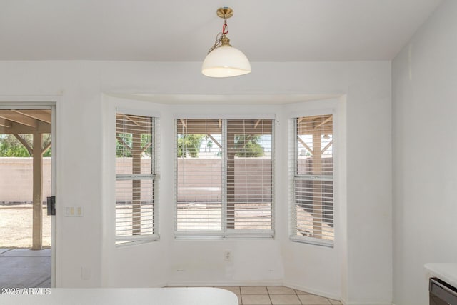1371 W Gary Dr, Chandler, AZ 85224 - unfurnished dining area with healthy amount of natural light and light tile patterned flooring