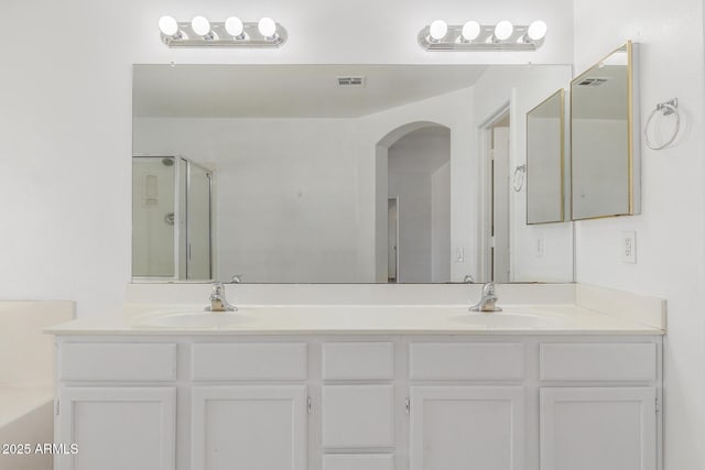 1371 W Gary Dr, Chandler, AZ 85224 - bathroom with double vanity, a shower stall, and a garden tub