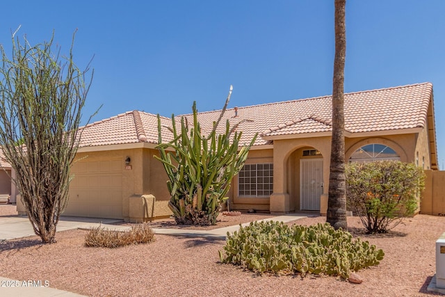 1371 W Gary Dr, Chandler, AZ 85224 - view of front of house with stucco siding, an attached garage, a tile roof, and concrete driveway
