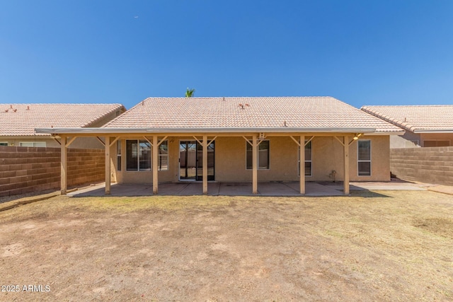 1371 W Gary Dr, Chandler, AZ 85224 - rear view of house featuring stucco siding, a tiled roof, and a patio