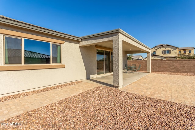 rear view of house with a patio area