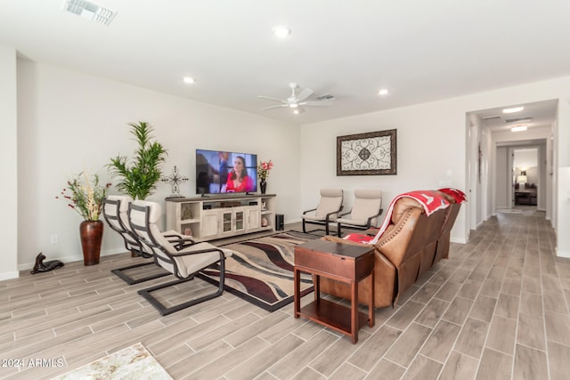 living room with ceiling fan