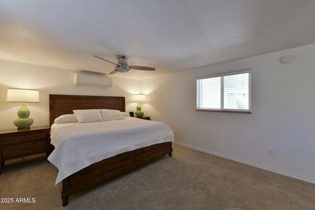 2273 Lindbergh Rd, Overgaard, AZ 85933 - bedroom featuring a wall unit AC, carpet floors, a ceiling fan, and baseboards