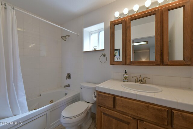 2273 Lindbergh Rd, Overgaard, AZ 85933 - bathroom featuring toilet, shower / bath combination with curtain, and vanity