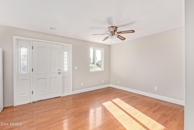 entrance foyer with ceiling fan and light hardwood / wood-style floors