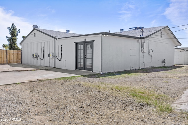 back of property featuring a patio area, french doors, and fence