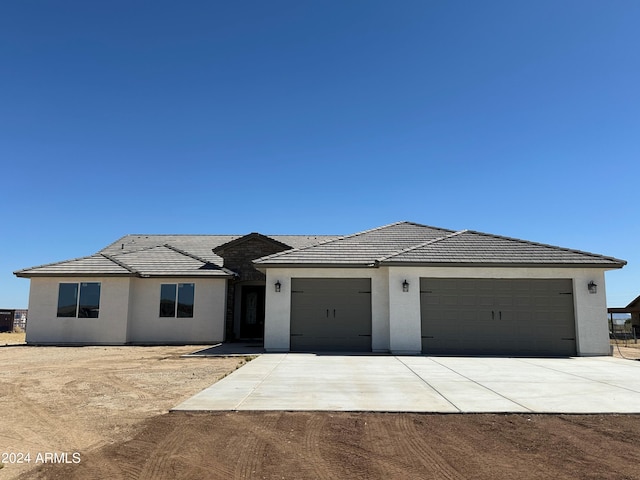 view of front of house with a garage