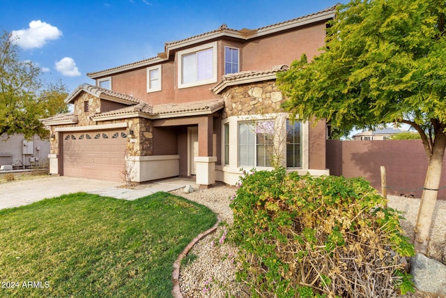 mediterranean / spanish-style house featuring a garage