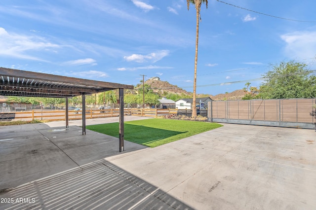 view of patio with fence