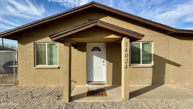 entrance to property with fence