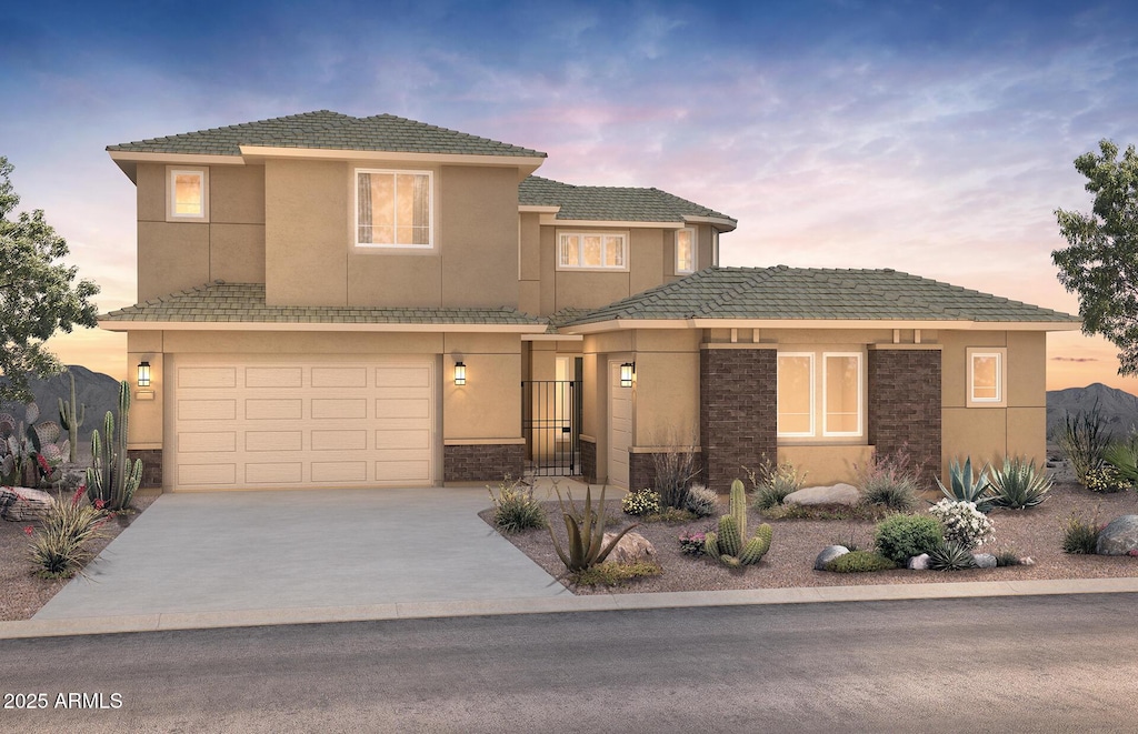 view of front of home with a garage