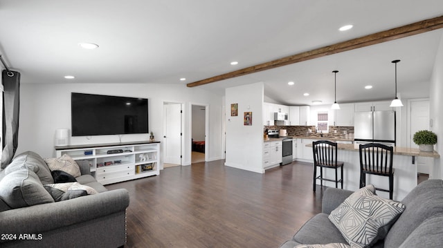 living room with vaulted ceiling with beams and dark hardwood / wood-style floors