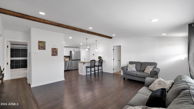 living room featuring lofted ceiling with beams and dark wood-type flooring