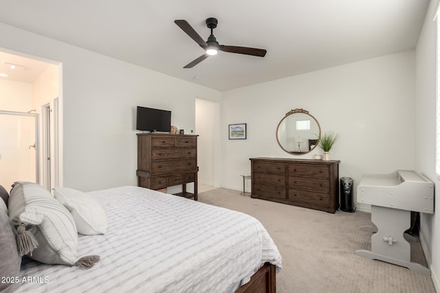 bedroom featuring light carpet, ceiling fan, and baseboards