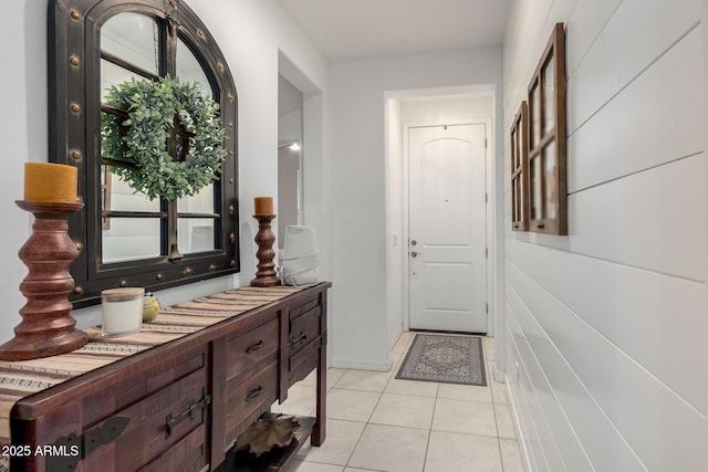 entrance foyer featuring light tile patterned floors