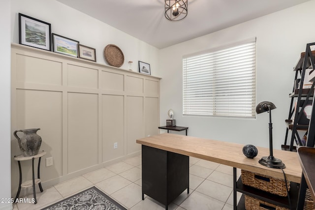 home office with light tile patterned floors