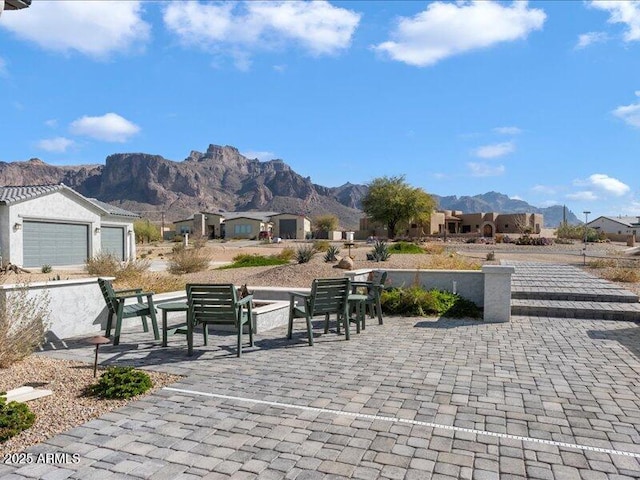 view of community with a mountain view