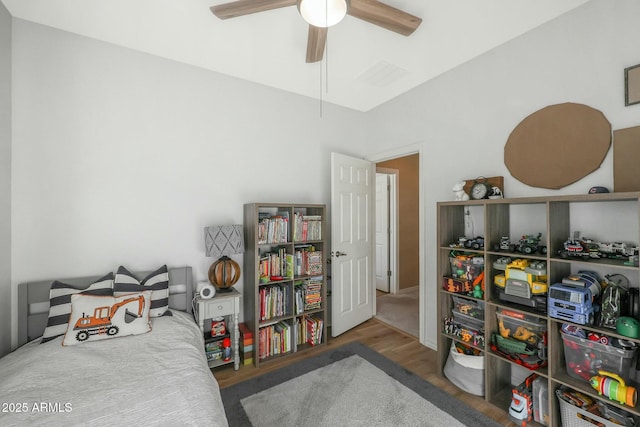 18841 E Pelican Ct, Queen Creek, AZ 85142 - bedroom with visible vents, wood finished floors, and a ceiling fan