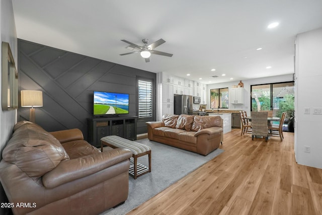 18841 E Pelican Ct, Queen Creek, AZ 85142 - living room featuring recessed lighting, light wood-style floors, and a ceiling fan