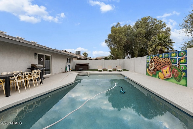 view of pool with a fenced in pool, a fenced backyard, grilling area, a patio, and a hot tub