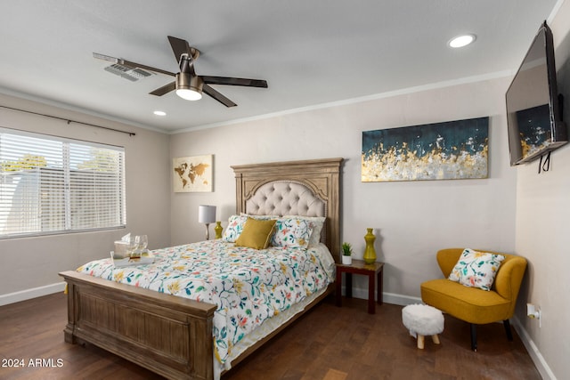 bedroom featuring crown molding, ceiling fan, and dark hardwood / wood-style floors