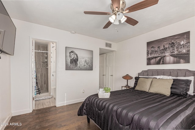 bedroom with ceiling fan, dark hardwood / wood-style floors, and ensuite bath