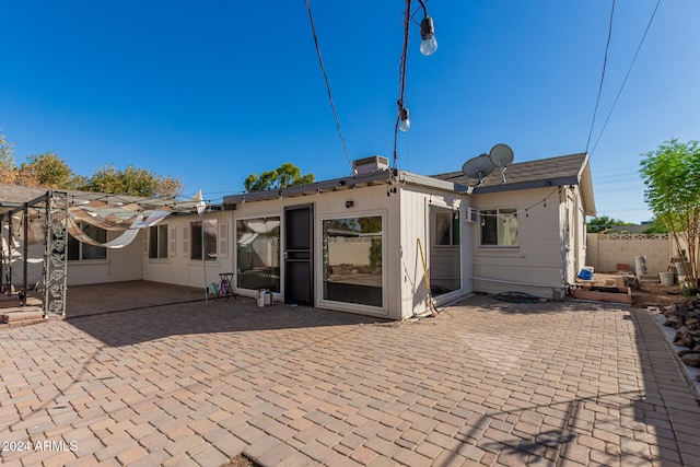 back of property with a patio area