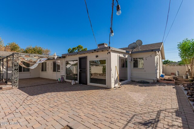 2518 E Campbell Ave, Phoenix, AZ 85016 - rear view of property featuring a patio and fence