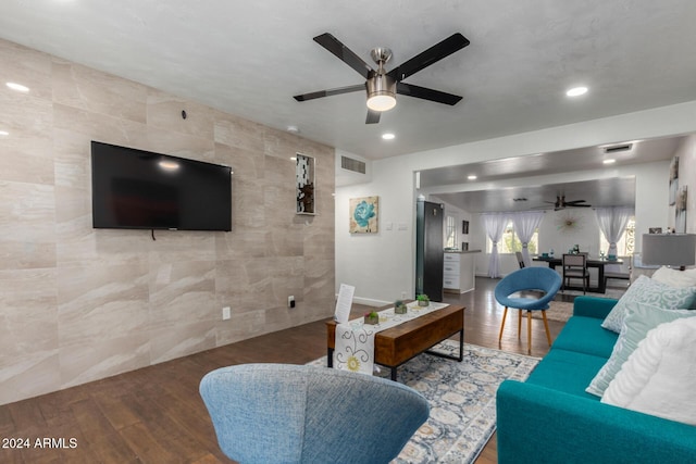 2518 E Campbell Ave, Phoenix, AZ 85016 - living area featuring a ceiling fan, tile walls, wood finished floors, and recessed lighting