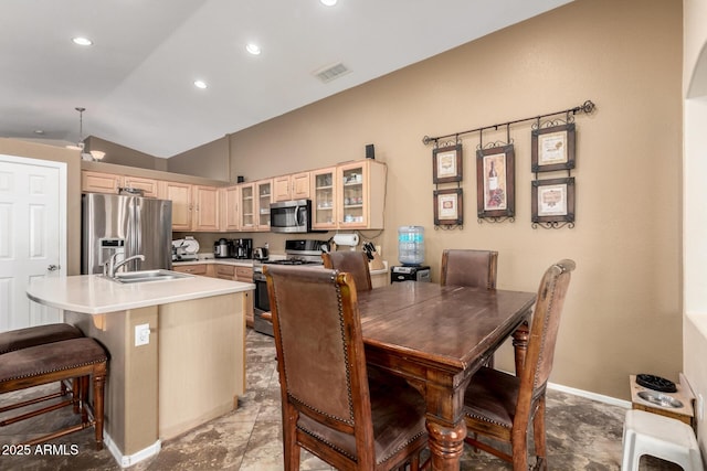 4038 E Wrangler Ct, Gilbert, AZ 85297 - dining room featuring lofted ceiling, baseboards, and recessed lighting