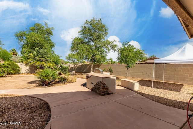4038 E Wrangler Ct, Gilbert, AZ 85297 - fenced backyard featuring a patio area