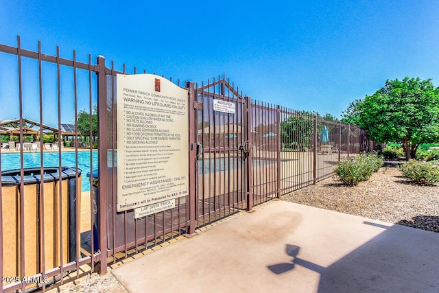 4038 E Wrangler Ct, Gilbert, AZ 85297 - view of property's community featuring a gate