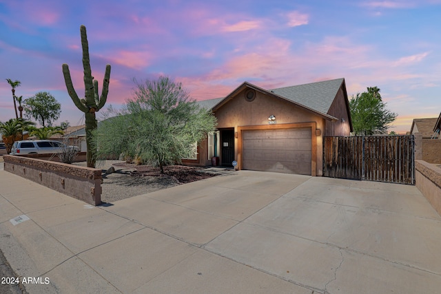 view of front of property with a garage