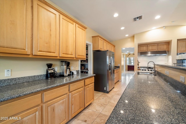 5535 N 13th St, Phoenix, AZ 85014 - kitchen featuring visible vents, lofted ceiling, a sink, under cabinet range hood, and stainless steel fridge