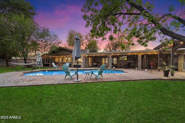 5535 N 13th St, Phoenix, AZ 85014 - outdoor pool featuring a patio area and a lawn
