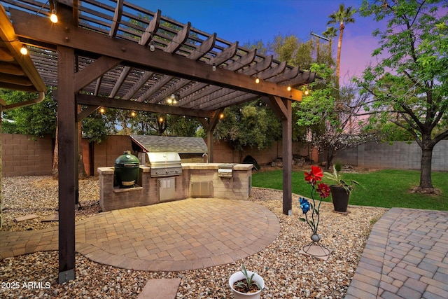 5535 N 13th St, Phoenix, AZ 85014 - view of patio / terrace featuring an outdoor kitchen, a fenced backyard, a pergola, and a grill