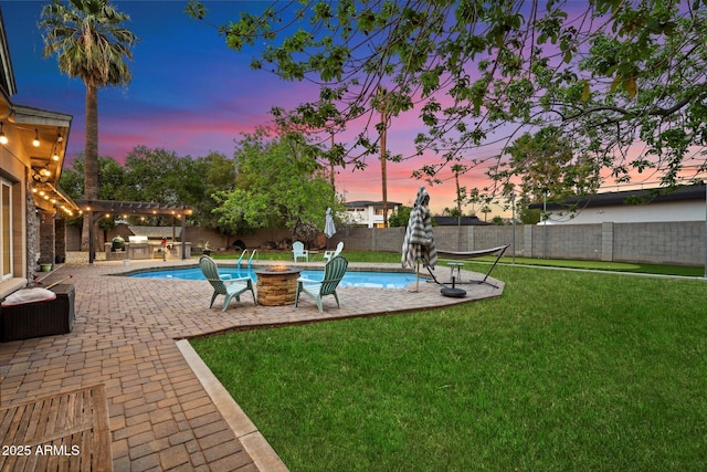 5535 N 13th St, Phoenix, AZ 85014 - view of pool featuring a lawn, a pergola, a fenced backyard, a fire pit, and a fenced in pool