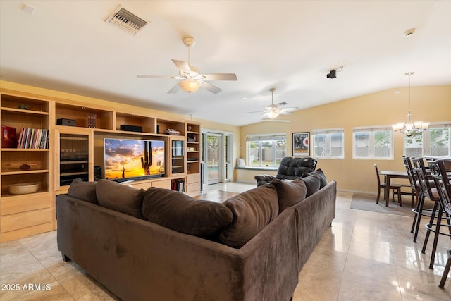 5535 N 13th St, Phoenix, AZ 85014 - living room with vaulted ceiling, plenty of natural light, ceiling fan with notable chandelier, and visible vents