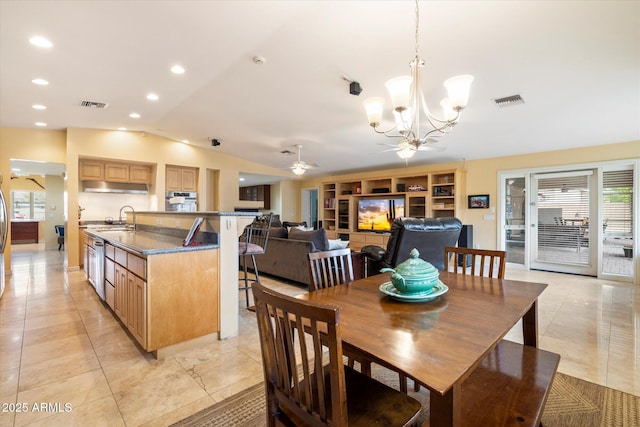 5535 N 13th St, Phoenix, AZ 85014 - dining area with lofted ceiling, recessed lighting, ceiling fan with notable chandelier, and visible vents