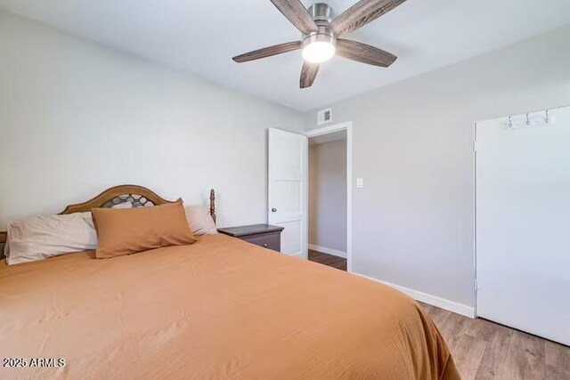 2723 Towell St, Overgaard, AZ 85933 - bedroom featuring wood finished floors, baseboards, and a ceiling fan