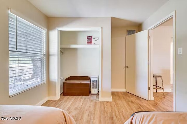 2723 Towell St, Overgaard, AZ 85933 - bedroom with wood finished floors, baseboards, and a closet