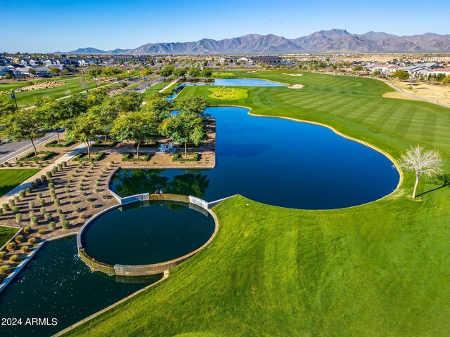 aerial view featuring a water and mountain view