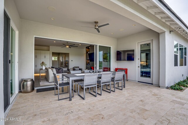 view of patio / terrace with ceiling fan