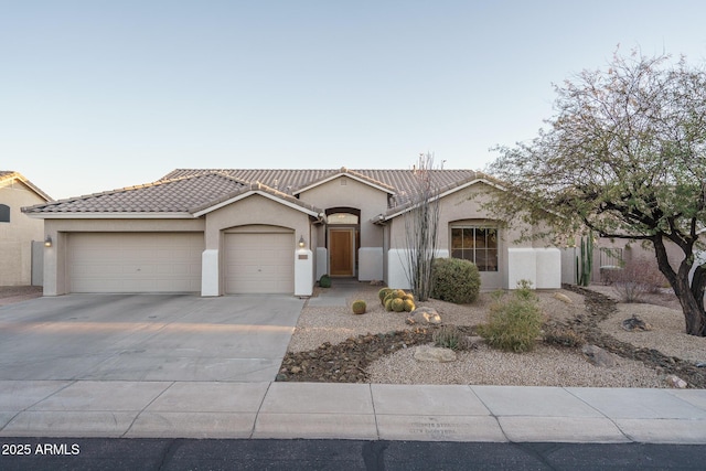 view of front of house with a garage